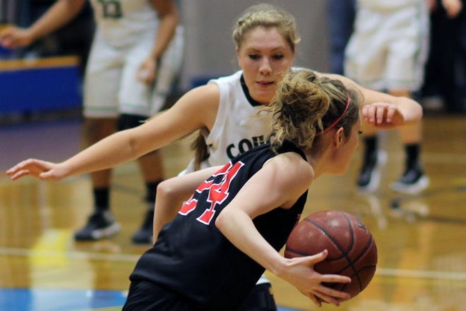 Weed senior Elyssa Fisher, shown playing defense, is a three-year varsity starter for the defending champion Cougars.