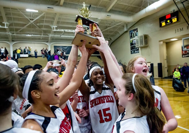 Springfield High's Kierra Weir (15) celebrates with teammates Thursday after the Senators beat Sacred Heart-Griffin 53-35 to clinch their second straight Girls City Basketball Tournament title. JUSTIN L. FOWLER/THE STATE JOURNAL-REGISTER