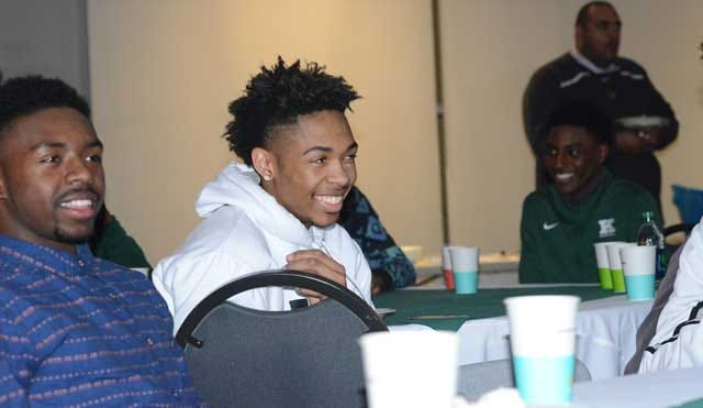 Kinston senior Brandon Ingram smiles along with Vikings basketball teammates Wednesday as he and family and friends gathered at the Woodmen Center for his McDonald's All-American Games selection.