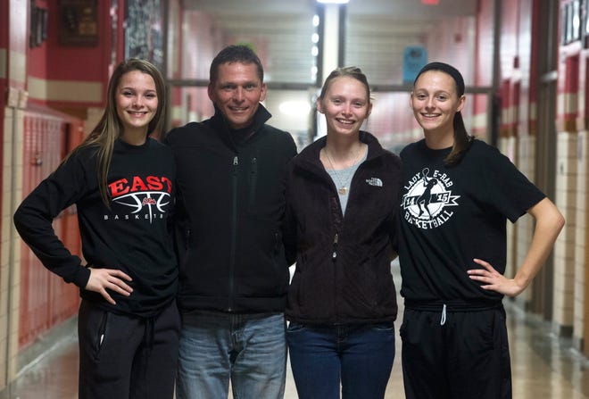 From left: Mallory Hecox, Rodney Hecox, Kaimberlyn Hecox, and Madi Hecox gather before the girls basketball game Jan. 21 at East High School. 

SUNNY STRADER/RRSTAR.COM