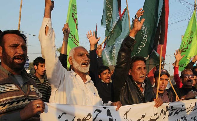 Fareed Khan/The Associated PressPakistani protesters condemn a bombing at a Shiite mosque on Friday in Karachi, Pakistan.