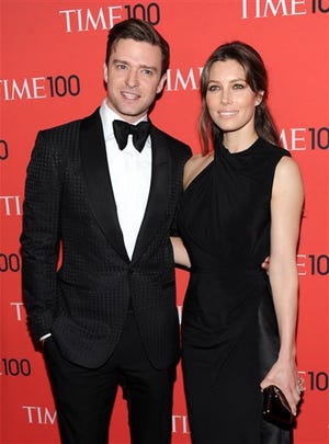 FILE - In this Tuesday April 23, 2013 file photo, actor and singer Justin Timberlake and wife, actress Jessica Biel, attend the TIME 100 Gala in New York. Timberlake shared a picture of a bulging belly - presumably belonging to wife - on Instagram on Saturday, Jan. 31, 2015, his 34th birthday. He wrote that he was getting the greatest gift ever this year and added