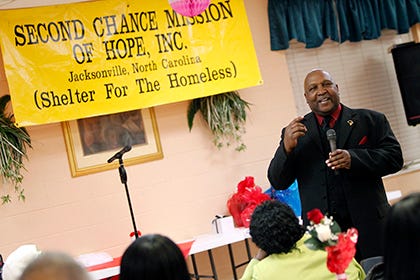 Rev. William McCoy speaks during the Second Chance Mission of Hope, Inc. 30th anniversary banquet at First Missionary Baptist in Jacksonville.
