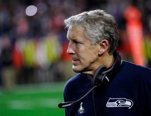 Seattle Seahawks head coach Pete Carroll watches from the sidelines during the second half of NFL Super Bowl XLIX in Glendale, Ariz.