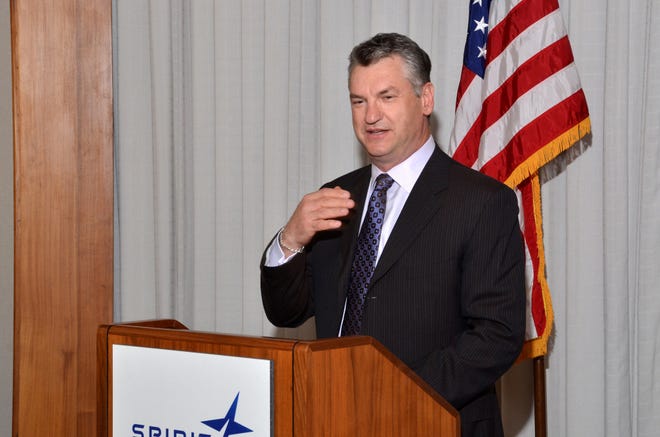 Spirit AeroSystems President and CEO Larry Lawson speaks at a Kansas Employer Support of the Guard and Reserve award ceremony. Spirit released its fourth-quarter and year-end 2014 earnings statement Tuesday.
