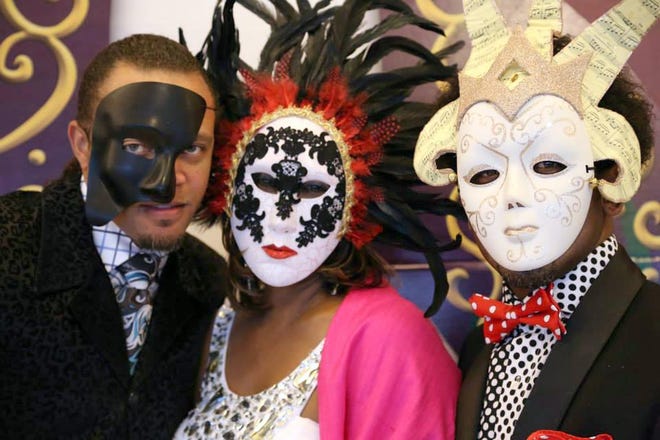 From left, Chadrick Smith, PhilAnn Smith and Victor Smith, pose at last year's ball. This year's event will be held Feb. 21. A Night in New Orleans Masquerade Ball will benefit the Because We Care Fund, which helps cancer patients in Cleveland County. (Photo submitted by HealthCare Foundation of Cleveland County)