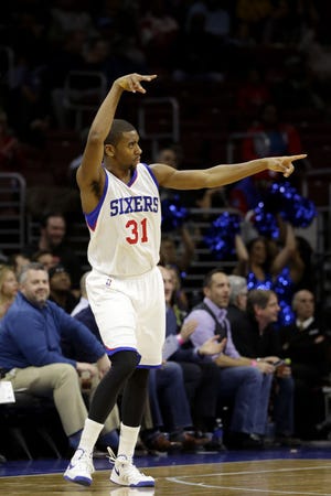 The 76ers' Hollis Thompson reacts after hitting one of his four first-half 3-pointers en route to scoring a career-high 23 points in Tuesday's 105-98 victory over the Nuggets.