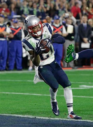 Patriots defensive back Malcolm Butler intercepts a pass at the goal line in Super Bow XlIX on Sunday, Feb. 1, 2015.