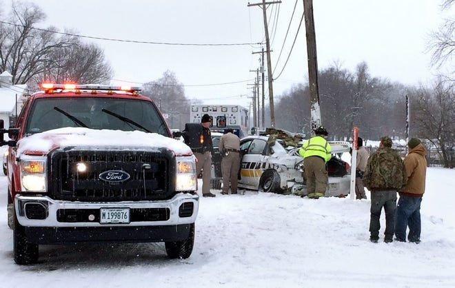 Emergency crews respond to an accident Wednesday in the 4900 block of North Galena Road involving a Peoria County Sheriff's Office patrol car and another vehicle. Two people including a sheriff's deputy were injured in the crash.