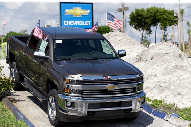 A 2015 Chevrolet Silverado 2500 Crew Cab pickup truck at a dealership in Florida. GM set a company record in 2014 for global sales,