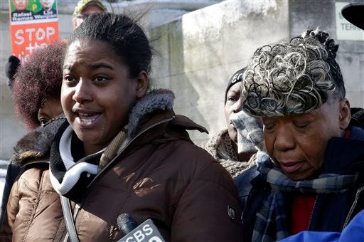 Erica Garner, left, daughter of chokehold death victim Eric Garner, and his mother Gwen Carr, talk to the press after attending a court hearing, in the Staten Island borough of New York, Thursday, Feb. 5, 2015. Civil liberties lawyers urged a state judge on Thursday to reveal secret grand jury testimony concerning the police chokehold death of Eric Garner, an unarmed man, saying the public needs to reconcile a video of the arrest with the decision not to indict the officer involved. (AP Photo/Richard Drew)