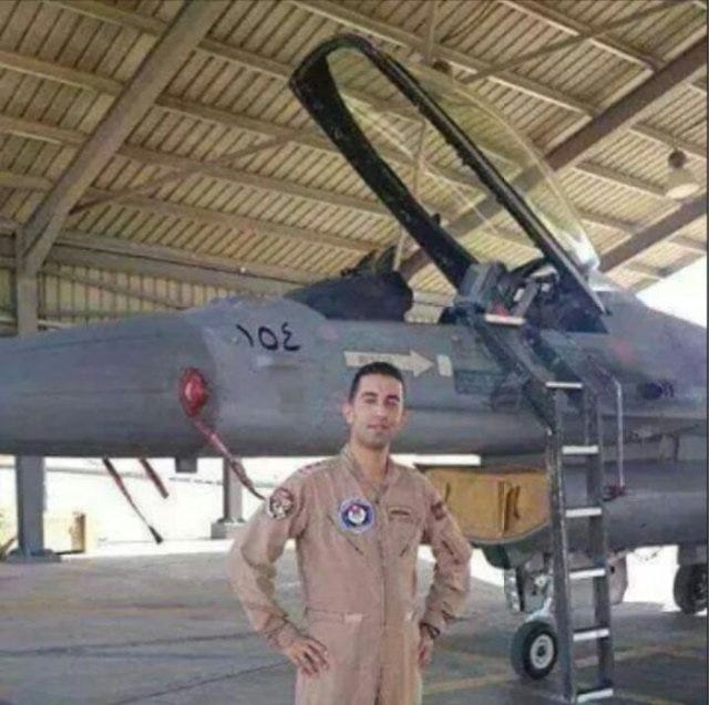 Photo of Jordanian pilot Moath al-Kasasbeh in uniform. ISIS militants claimed they captured al-Kasasbeh on Wednesday, Dec. 24, 2014 after claiming to have shot down a coalition warplane over Syria. Video and still images surfaced on Feb. 3, 2015, showing the pilot behing burned alive while confined in a cage.