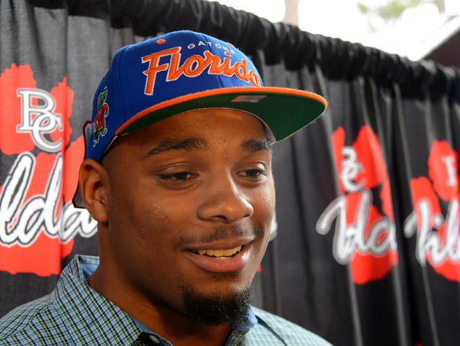 CeCe Jefferson speaks to the media after announcing that he will sign with University of Florida on national signing day from his home in Macclenny, Fla., Wednesday, Feb. 4, 2015.