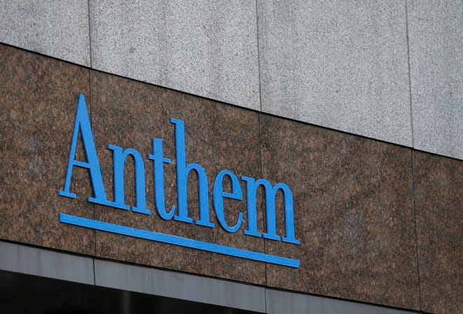 This Wednesday, Dec. 3, 2014 file photo shows the Anthem logo at the company's corporate headquarters in Indianapolis. Health insurer Anthem said in a statement Wednesday Feb. 4, 2015 hackers infiltrated its computer network and accessed a swathe of personal information about current and former customers including their incomes and street addresses. (AP Photo/Darron Cummings, File)