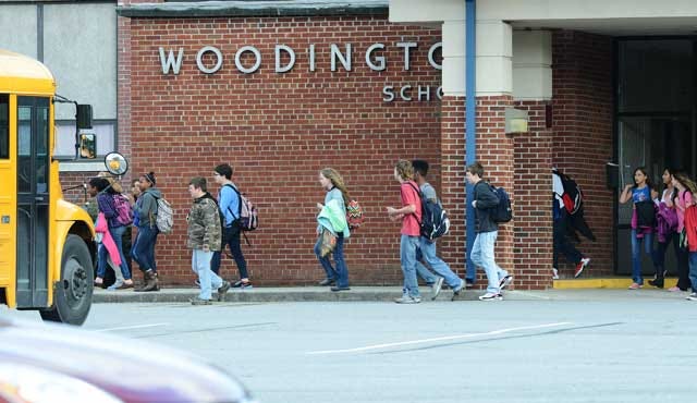Students exit Woodington Middle School on Thursday. The state Department of Public Instruction released a state, school-by-school letter grade performance report early Thursday afternoon.