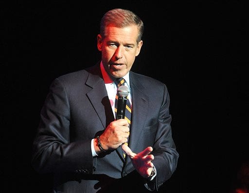 In this Nov. 5, 2014 file photo, Brian Williams speaks at the 8th Annual Stand Up For Heroes, presented by New York Comedy Festival and The Bob Woodruff Foundation in New York. NBC News has assigned the head of its own investigative unit to look into statements made by the anchor Williams about his reporting in Iraq a dozen years ago. A source at the network who requested anonymity because the person is not authorized to speak on personnel matters confirmed the investigation on Friday, Feb. 6, 2015. (Photo by Brad Barket/Invision/AP, File)