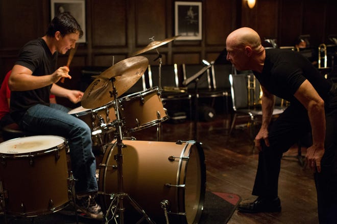 This image released by Sony Pictures Classics shows Miles Teller, left, and J.K. Simmons in a scene from "Whiplash." (Sony Pictures Classics, Daniel McFadden)