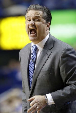 Kentucky coach John Calipari shouts instructions to his players during the second half against Vanderbilt in Lexington, Ky., on Jan. 20. The Wildcats are 22-0 and 9-0 in the SEC.  James Crisp Associated Press