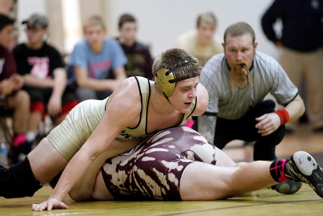 Croatan’s Andrew Colburn had the advantage against Dixon’s Lex Padgett during their 195-pound weight class match Thursday night in the NCHSAA 2-A East Regional final. The Cougars advanced to Saturday’s state final with a 43-30 win over the Bulldogs.