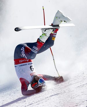 In this photo provided by Pentaphoto, United States' Bode Miller crashes during the men's super-G competition at the alpine skiing world championships, Thursday, Feb. 5, 2015, in Beaver Creek, Colo. Miller did not finish the race. (AP Photo/Pentaphoto, Shinichiro Tanaka)