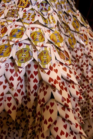 Casino playing cards are the material for the Valentine’s Day dress. (Chris Pietsch/The Register-Guard)