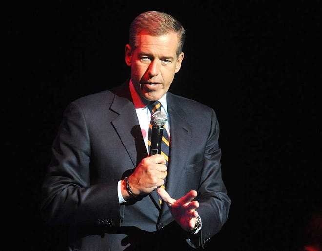 FILE - In this Nov. 5, 2014 file photo, Brian Williams speaks at the 8th Annual Stand Up For Heroes, presented by New York Comedy Festival and The Bob Woodruff Foundation in New York. NBC News has assigned the head of its own investigative unit to look into statements made by the anchor Williams about his reporting in Iraq a dozen years ago. A source at the network who requested anonymity because the person is not authorized to speak on personnel matters confirmed the investigation on Friday, Feb. 6, 2015. (Photo by Brad Barket/Invision/AP, File)