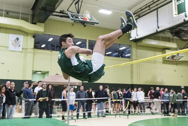 Jordan Pacheco won the high jump, clearing 5 feet, 8 inches in the Janiak Invitational held at Greater New Bedford Vocational Technical High School. RYAN FEENEY/CHRONICLE