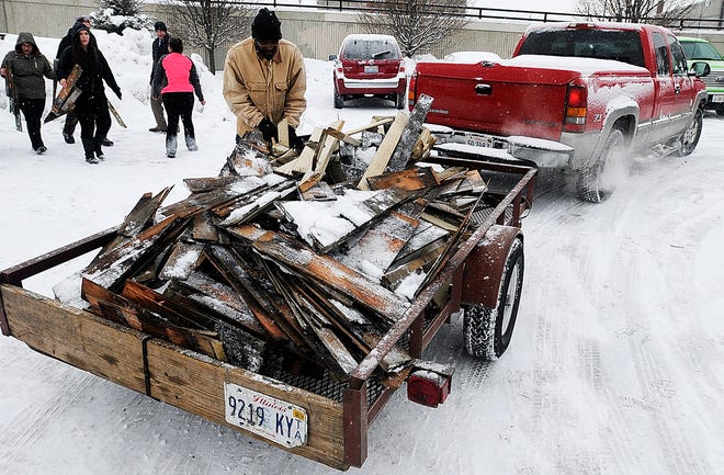 In this Feb. 3, 2015 photo, remnants of a gazebo sent to the City of Kankakee, Ill., as a gift from late-night talk show host David Letterman in 1999 sit on a trailer at a park after being dismantled by Kankakee High School students who are planning a prank on Letterman. After Places Rated Almanac called Kankakee the worst metropolitan area to live in the U.S. and Canada in 1999, Letterman poked fun with a Top 10 list and sent the two gazebos to spruce things up. The students are making a commemorative rocking chair out of the wood for Letterman’s retirement. (AP Photo/The Daily Journal, Mike Voss)