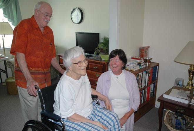 In this 2010 photo provided by Penny Weaver, author Nelle Harper Lee speaks with friends Wayne Greenhaw, left, and actress Mary Badham, during a visit in Lee's assisted living room in Monroeville, Ala. Friends and fans of the "To Kill A Mockingbird" author are perplexed by the publisher's Tuesday announcement that her decades-old manuscript for a sequel has been rediscovered and will be released. AP Photo/Penny Weaver