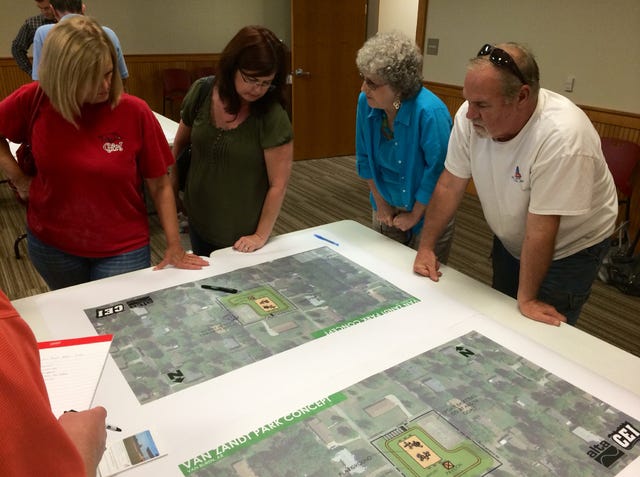 Times Record File Photo / Van Buren residents discuss the city park system at a public forum at the Van Buren Public Library on Tuesday, Sept. 23, 2014.