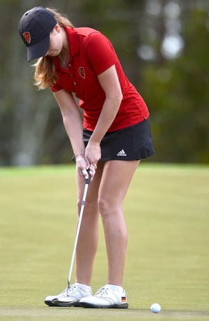 PETER.WILLOTT@STAUGUSTINE.COM Flagler College's Linn Weber putts on the 8 hole of the Slammer & Squire course at the World Golf Village during the second day of the World Golf Invitational tournament on Monday, February 9, 2015.