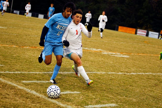 Southwest’s Kevin Hounshell (1) fights for the ball during the Stallions’ 1-0 overtime win over the N.C. School of Science and Math in the second round of the NCHSAA 2-A playoffs last season.