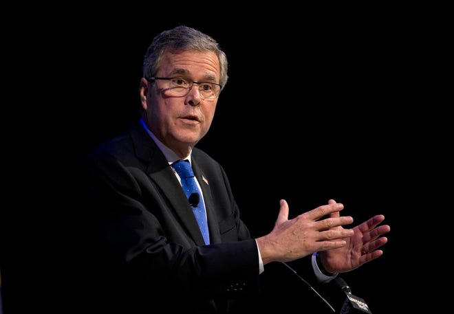In this Feb. 4, 2015 file photo, former Florida Gov. Jeb Bush speaks at a Economic Club of Detroit in Detroit. Stepping closer to a White House bid, Bush is ready to release thousands of emails and the first chapter of a related e-book designed to highlight his leadership style. The Republican said during a Monday conference call he would release the materials on Tuesday. He also cited the support from his family as he eyes the 2016 campaign and said, “My life is totally focused on this.” (AP Photo/Paul Sancya, File)