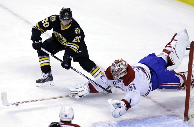 Bruins left wing Daniel Paille (shown trying to score on Canadiens goalie Carey Price on Sunday night) hasn't scored since November 21.