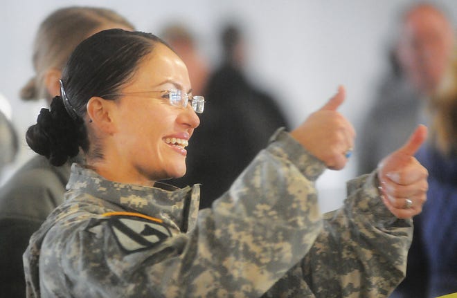 Second Lt. Rosalba Chavez gives a thumbs-up sign to her team members after they successfully completed an event during the inaugural LogistXGames held Jan. 29 at the Eastport Boulevard industrial park area of Sandston. Eight teams were on hand for the Olympic-style event that strengthened the connections within the area logistics community. (Terrance Bell/Fort Lee)