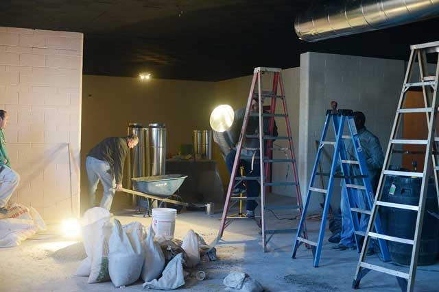 Painting, refinishing flooring and installing ductwork is underway as construction continues Wednesday inside the former Elks Lodge on Caswell Street. Plans are for Olivia’s catering business to relocate there by March 1.