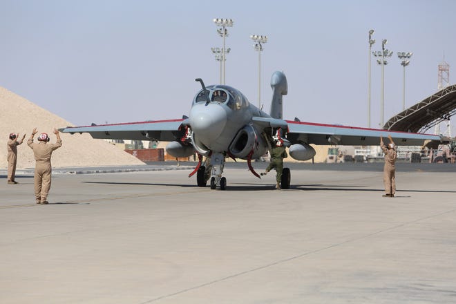 A U.S. Marine Corps EA-6B Prowler with Marine Tactical Electronic Warfare Squadron 4 returns from a training flight in Qatar in this U.S. Marine Corps photo. The Cherry Point squadron flew missions in support of operations in Marine Forces Central Command area, including against Islamic State militants.