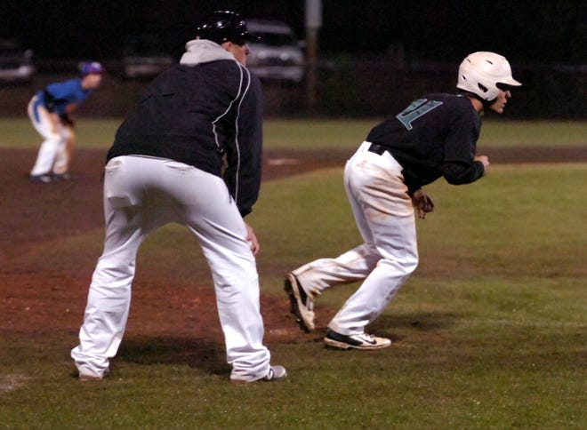 South Walton’s Jack Flynn plays off third base, looking for a steal.