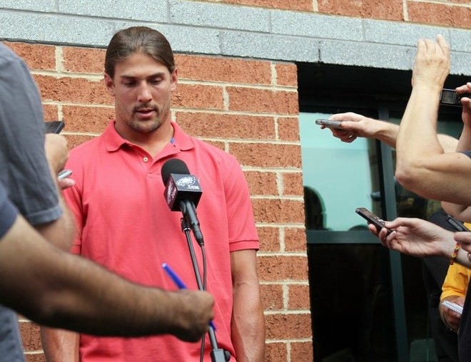 Eagles wide receiver Riley Cooper, shown here apologizing for his racial slur in the summer of 2013, is at the center of a controversy again after it was revealed that he is the cover boy for February on the team's calendar.