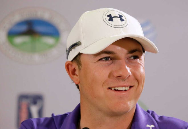 Jordan Spieth answers questions during a news conference at the AT&T Pebble Beach National Pro-Am golf tournament Wednesday, Feb. 11, 2015, in Pebble Beach, Calif. Spieth is among the top players at the tournament, and a little more. He is the first golfer since Tiger Woods to get a personal endorsement from title sponsor AT&T. (AP Photo/Eric Risberg)