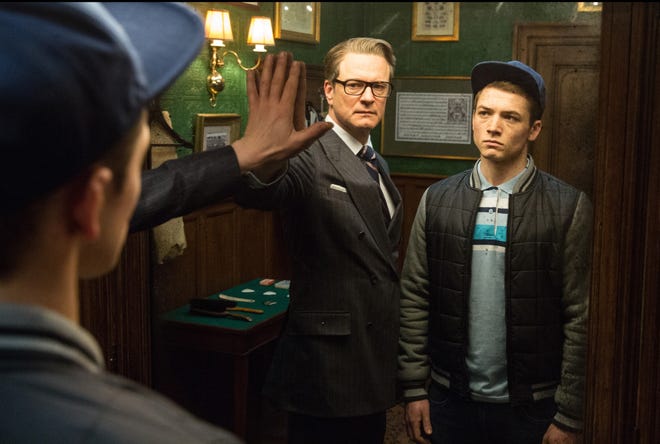 Colin Firth, left, plays a member of a secret spy agency and Taron Egerton is his protege in "Kingsman: The Secret Service." JAAP BUITENDIJK/20TH CENTURY FOX