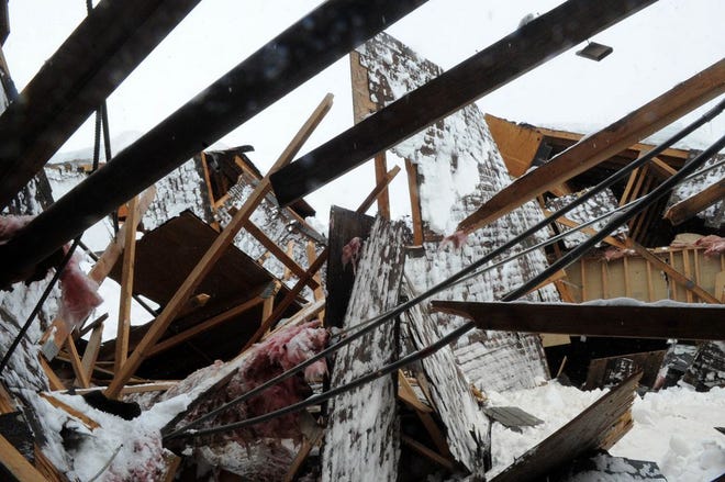 Roof collapse at Jenick, 31 Pinkham Street in Brockton on Wednesday Feb. 11, 2015.