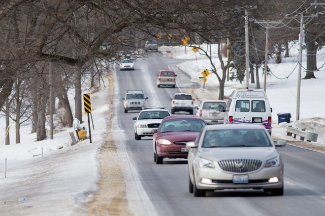 Vehicles travel down a a stretch of Guilford Road on Tuesday, Feb. 10, 2015, between Williamsburg and Roxbury roads in Rockford. MAX GERSH/RRSTAR.COM