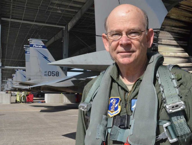Adjutant General of Florida Maj. Gen. Emmett Titshaw Jr. prepares for his final ride in an F-15 Eagle at the 125th Fighter Wing in Jacksonville, Fla., Jan. 29, 2015. The 45-minute flight in the back seat of the Florida Air National Guard's tactical jet ended more than four decades in the air for Titshaw, who has been flying military and commercial aircraft since the early '70s. He will retire in March. (Photo by Master Sgt. Thomas Kielbasa)