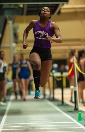 Monroe-Woodbury's Michelle Mitchell won the triple jump after finishing third in 55-meter hurdles final during OCIAA indoor track and field championships[ at West Point on Saturday. Kelly Marsh/For the Times Herald-Record