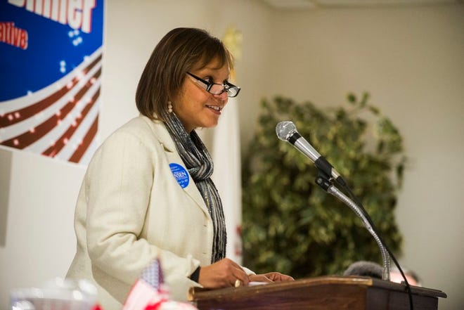 U.S. Rep. Robin Kelly, D-Chicago, speaks at Itoo Hall on Monday evening during the Peoria County Democrats Presidents Day Dinner. Kelly offered words to rally members of the Democratic Party in the area.