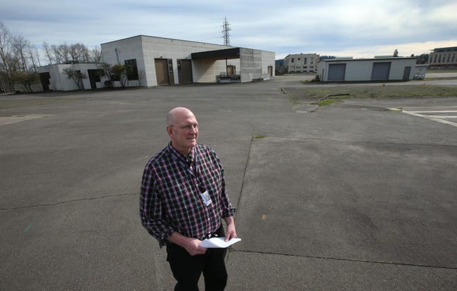 Roger Gray, EWEB General Manager, visits the property south of the Willamette River that the utility hopes to sell. (Chris Pietsch/The Register-Guard)