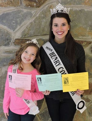 Little Miss Henry County Fair Caroline Girten and Miss Henry County Fair Maggie Schlindwein display entry forms which will be available March 1 in different colors for each of the three 2015 county fair pageants.