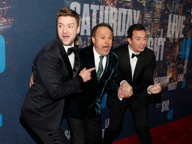 Justin Timberlake, left, Billy Crystal, center, and Jimmy Fallon attend the SNL 40th Anniversary Special at Rockefeller Plaza on Sunday night, in New York.