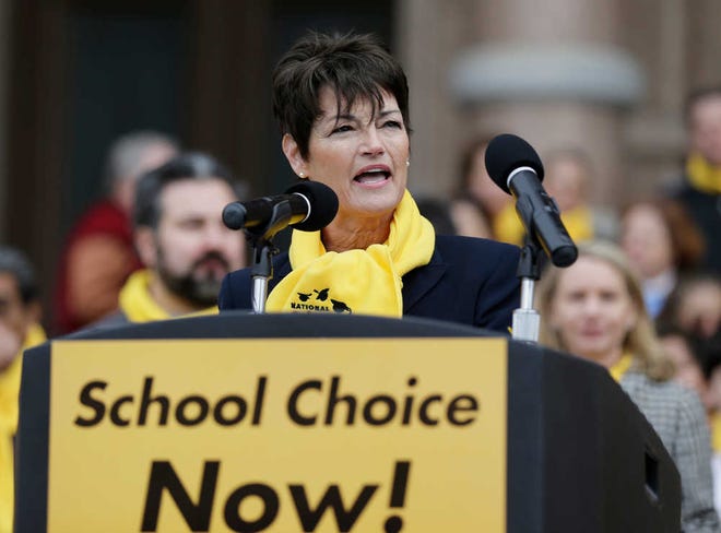 In this Friday, Jan. 30, 2015 photo, Sen. Donna Campbell, R-New Braunfels, takes part in a school choice rally at the Texas Capitol, in Austin, Texas. Campbell is also an emergency room doctor. (AP Photo/Eric Gay)